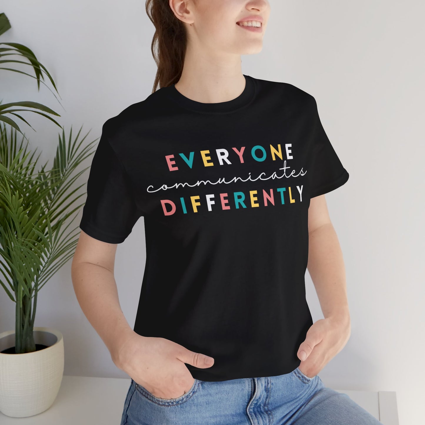 Everyone Communicates Differently White Text Unisex Jersey Short Sleeve Tee