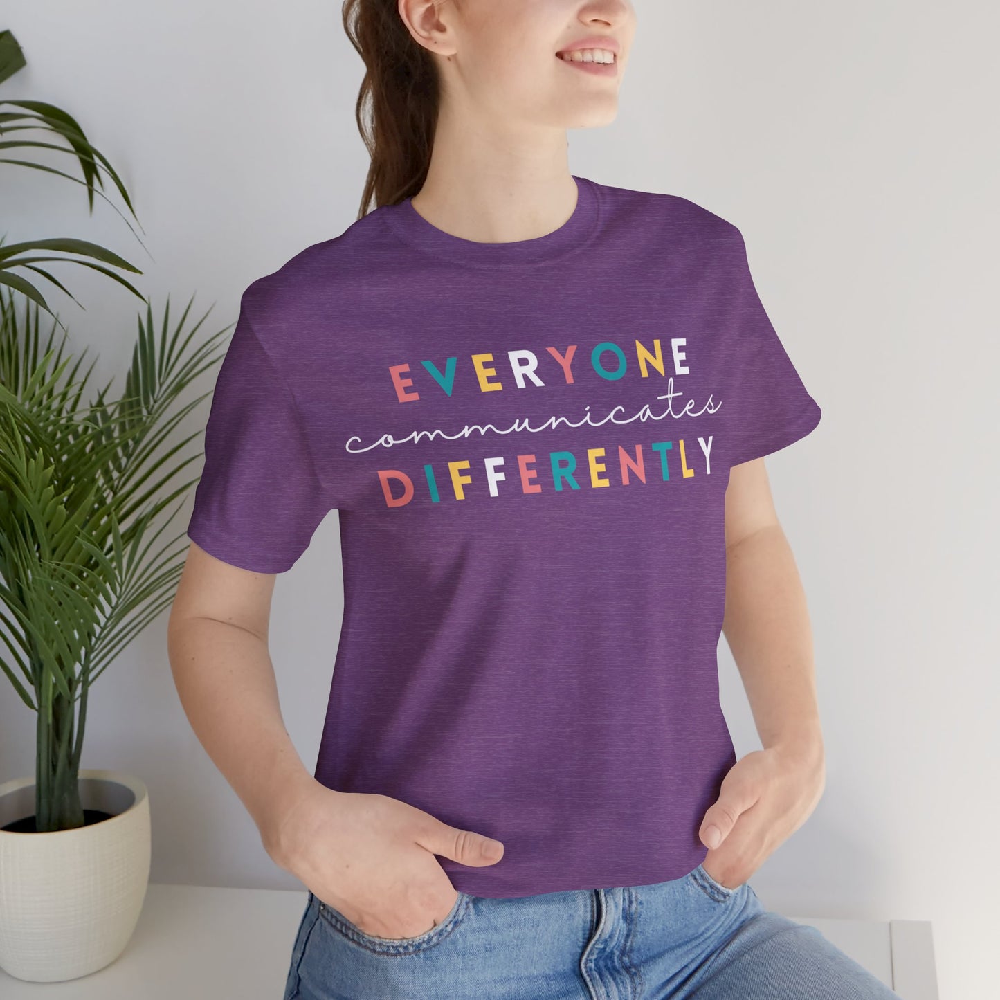 Everyone Communicates Differently White Text Unisex Jersey Short Sleeve Tee