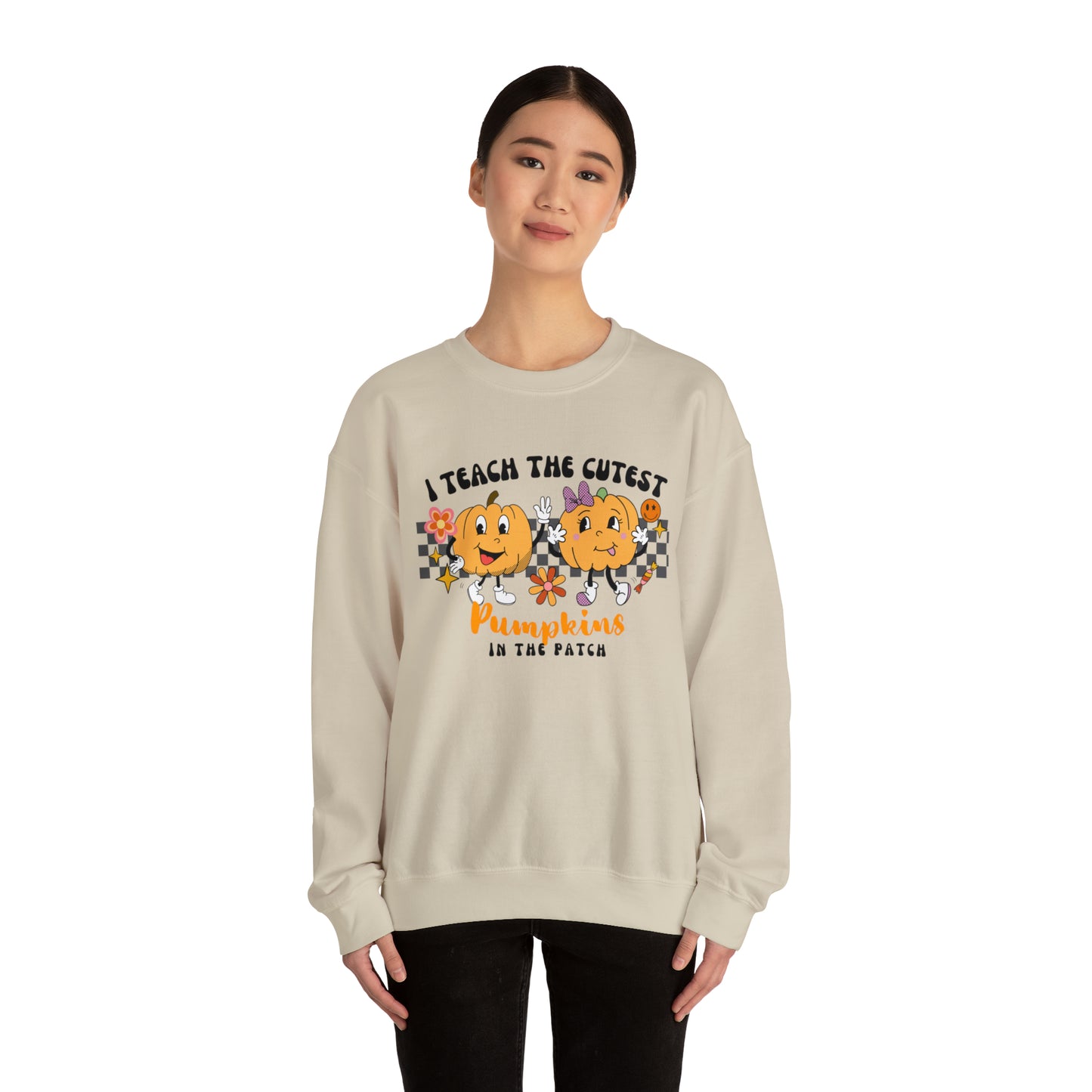 I Teach the Cutest Pumpkins Retro Unisex Heavy Blend™ Crewneck Sweatshirt