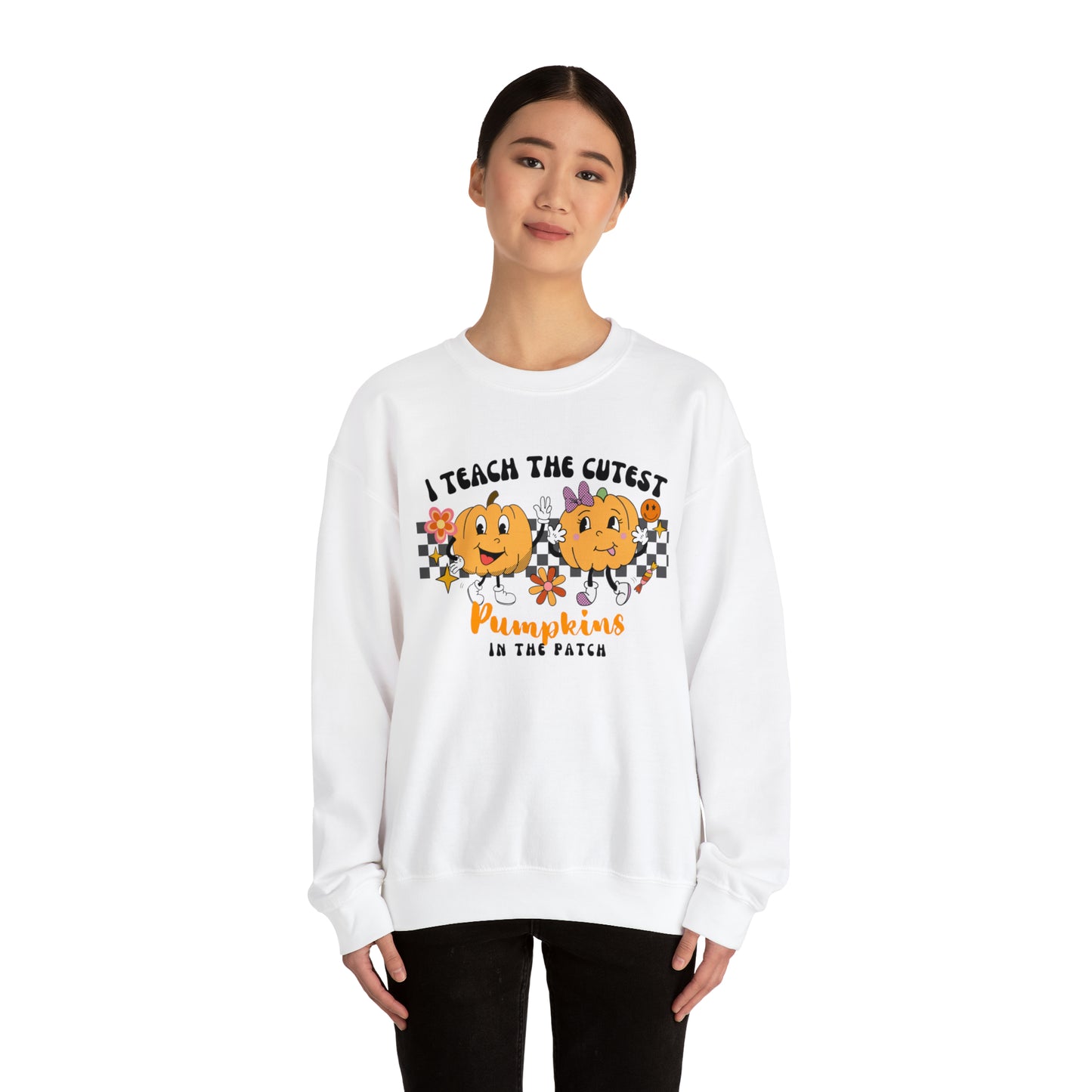 I Teach the Cutest Pumpkins Retro Unisex Heavy Blend™ Crewneck Sweatshirt