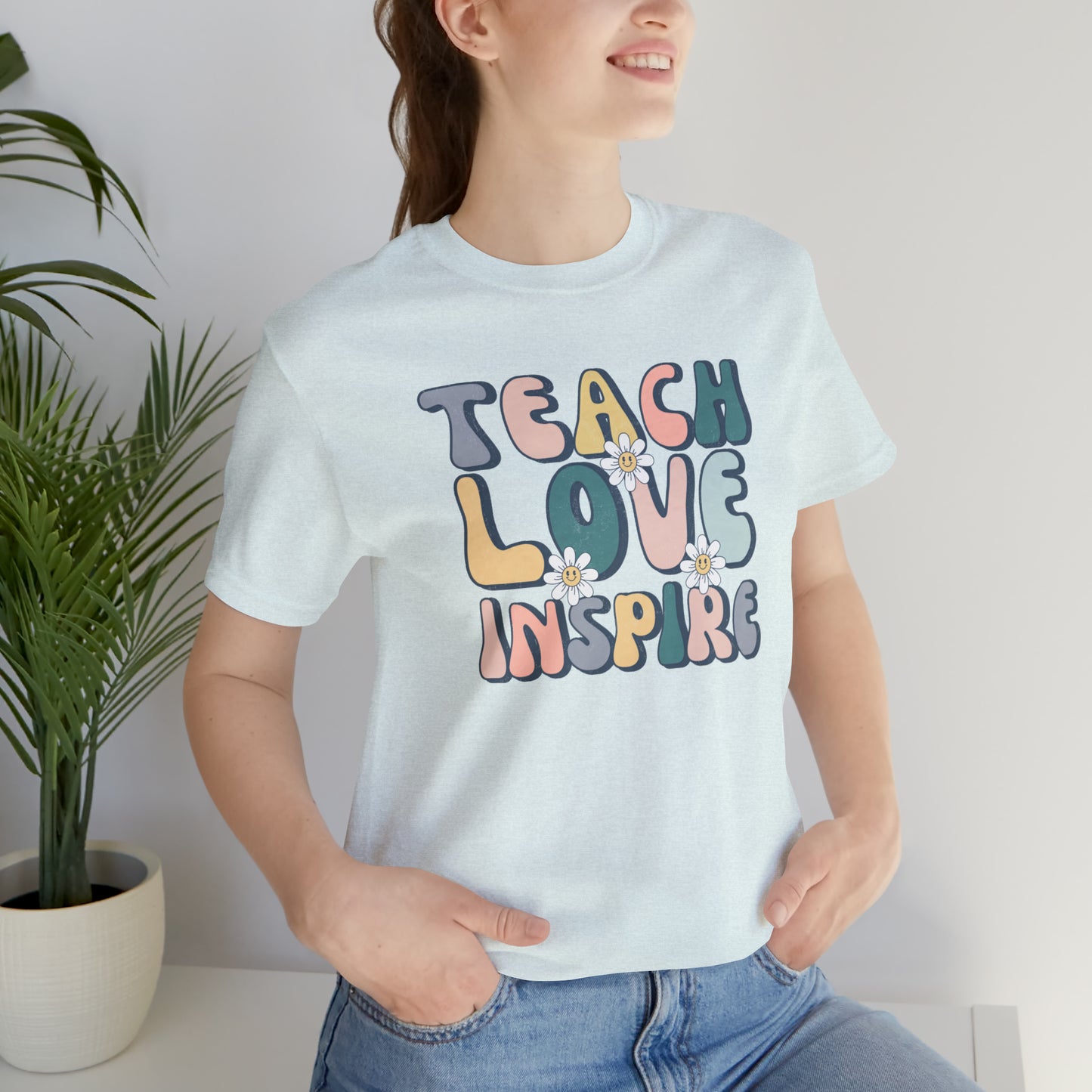 Teach Love Inspire Unisex Jersey Short Sleeve Tee