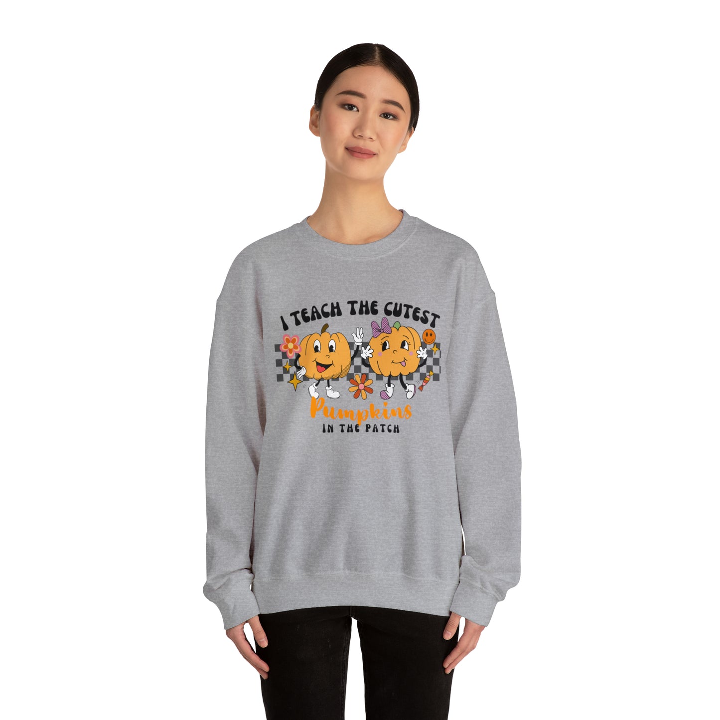 I Teach the Cutest Pumpkins Retro Unisex Heavy Blend™ Crewneck Sweatshirt