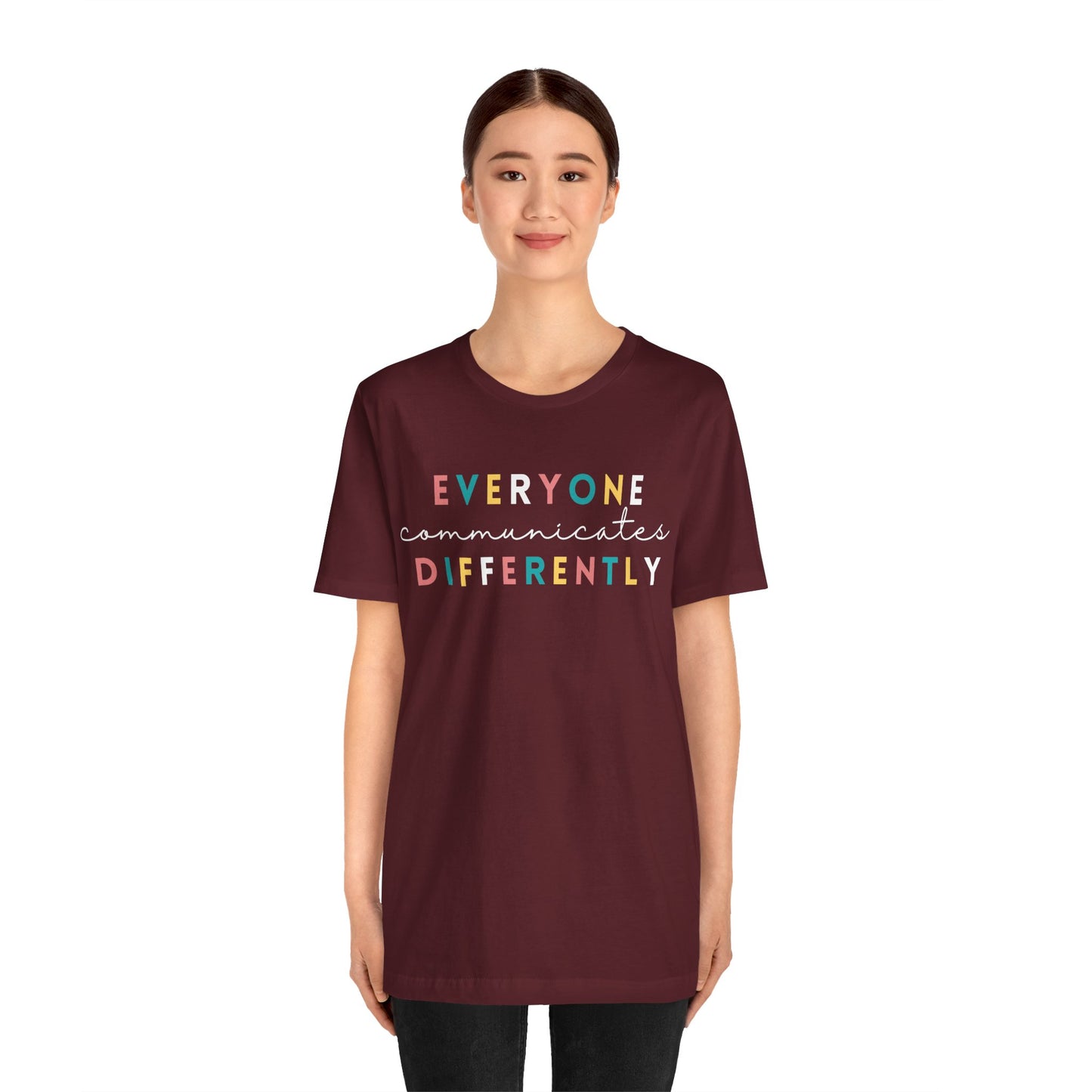 Everyone Communicates Differently White Text Unisex Jersey Short Sleeve Tee