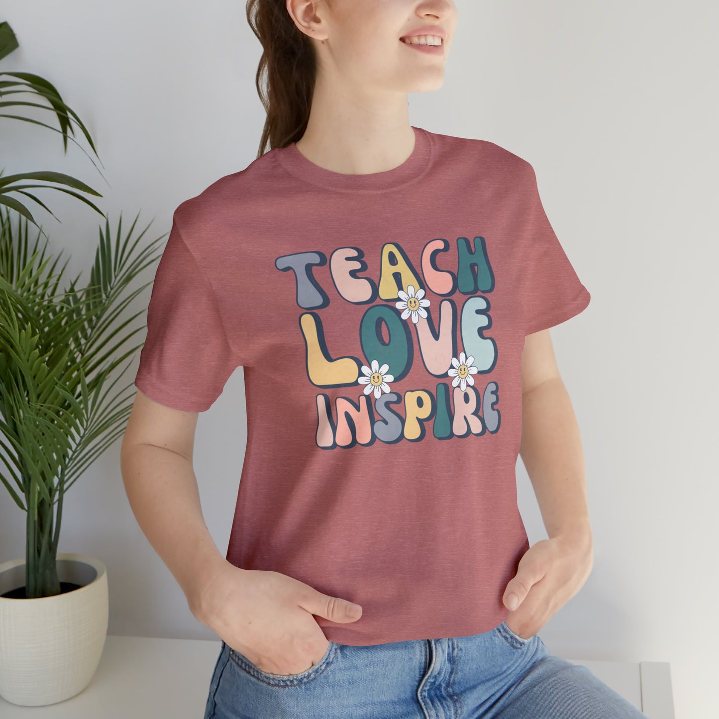 Teach Love Inspire Unisex Jersey Short Sleeve Tee