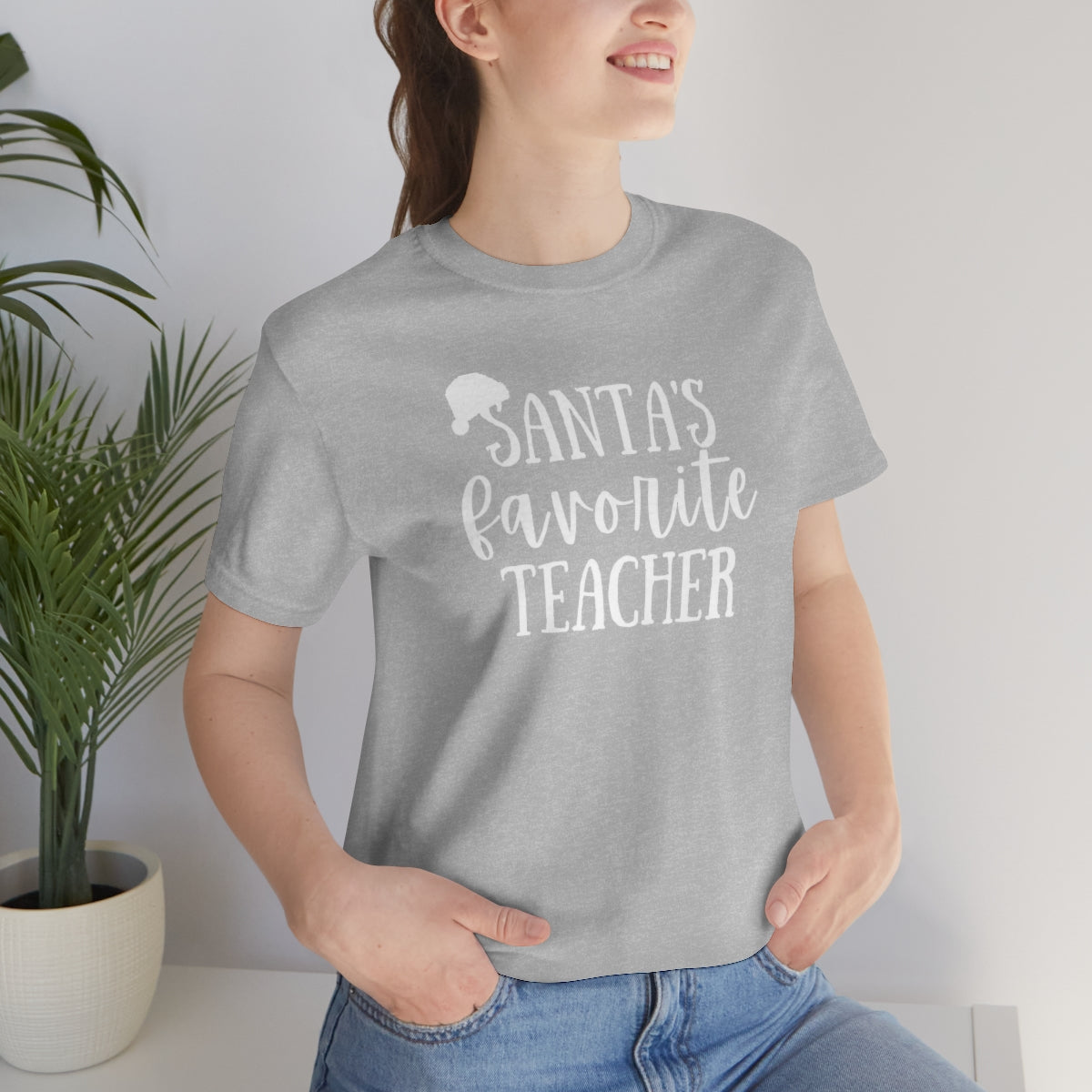 Santa's Favorite Teacher Unisex Jersey Short Sleeve Tee